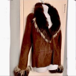 Shearling Lambskin with Fox Fur & Coyote Trim shearling lining.